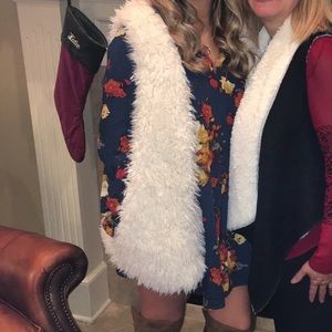 White fur vest